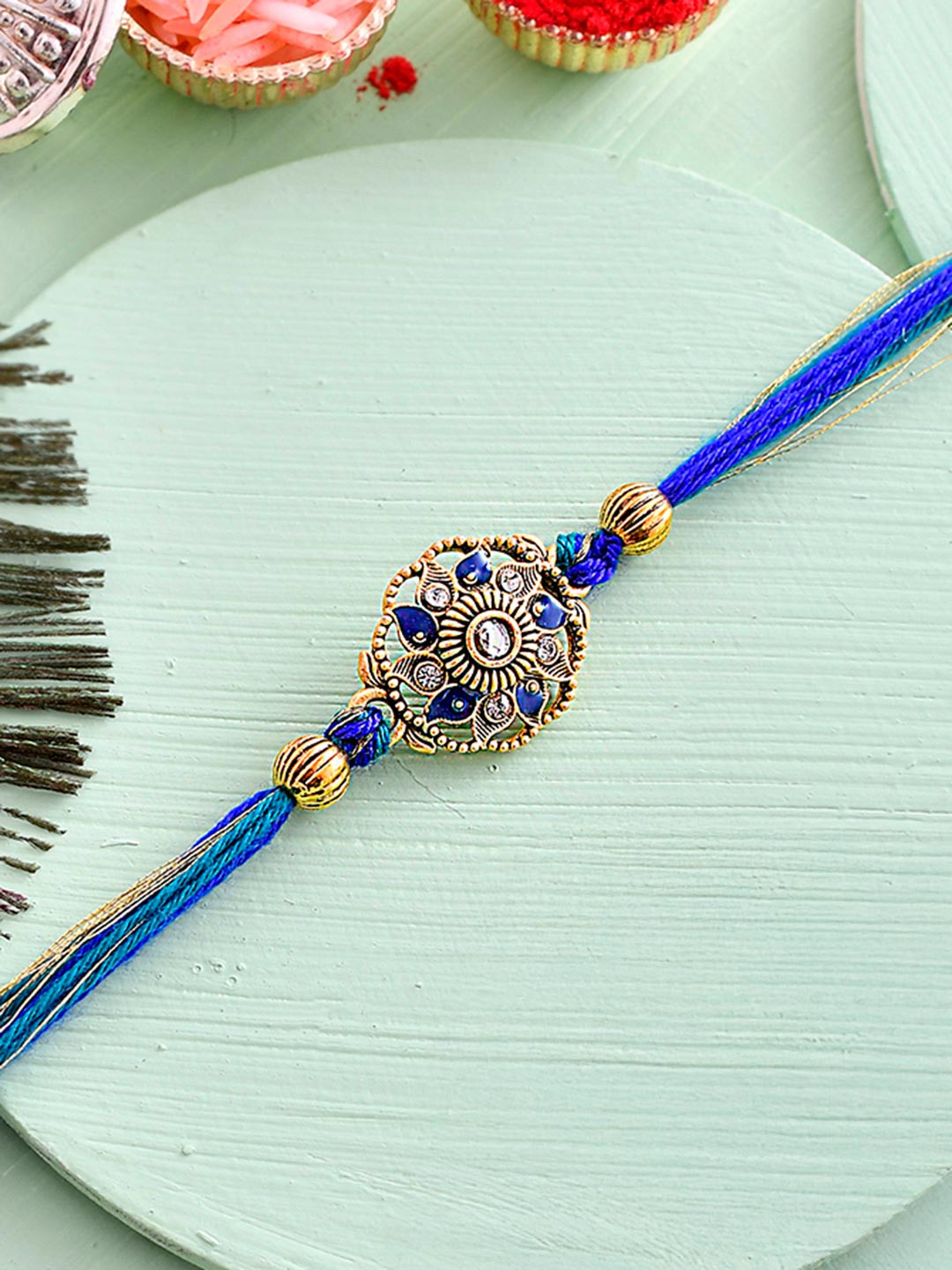 Blue And Green Enamelled Thread Rakhi For Brother