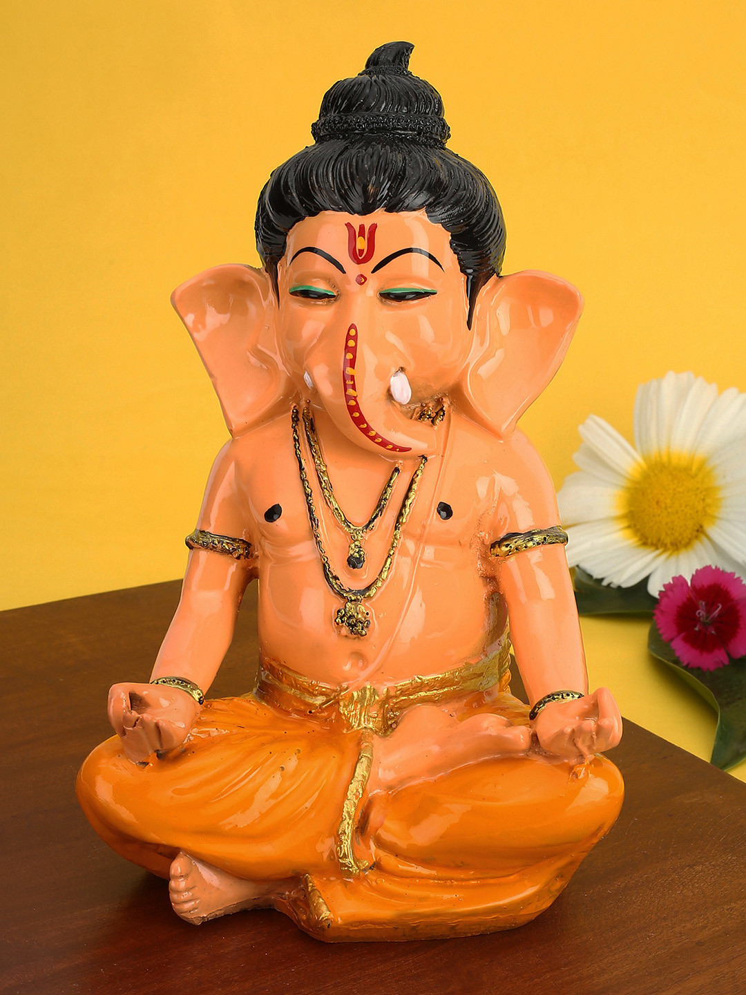 GW CREATIONS Orange-Coloured & Black Lord Ganesha Showpiece