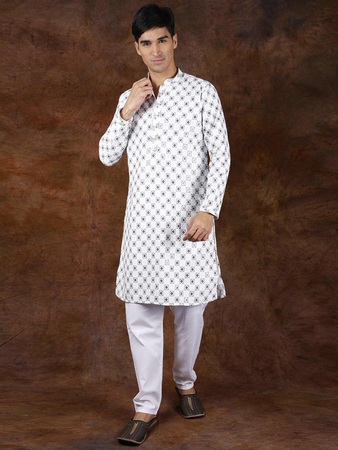 Exotic India White and Black Cotton Check Kurta Pajama with Sequins and Embroidery in Self