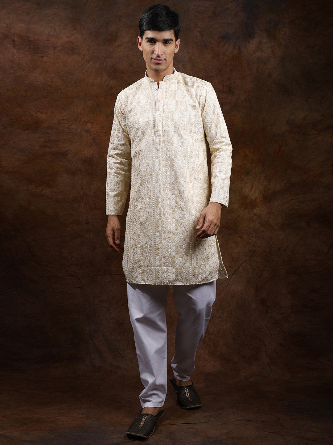 Exotic India Cloud Cream Pastel Kurta Pajama Set with All-Over Chikankari Embroidery