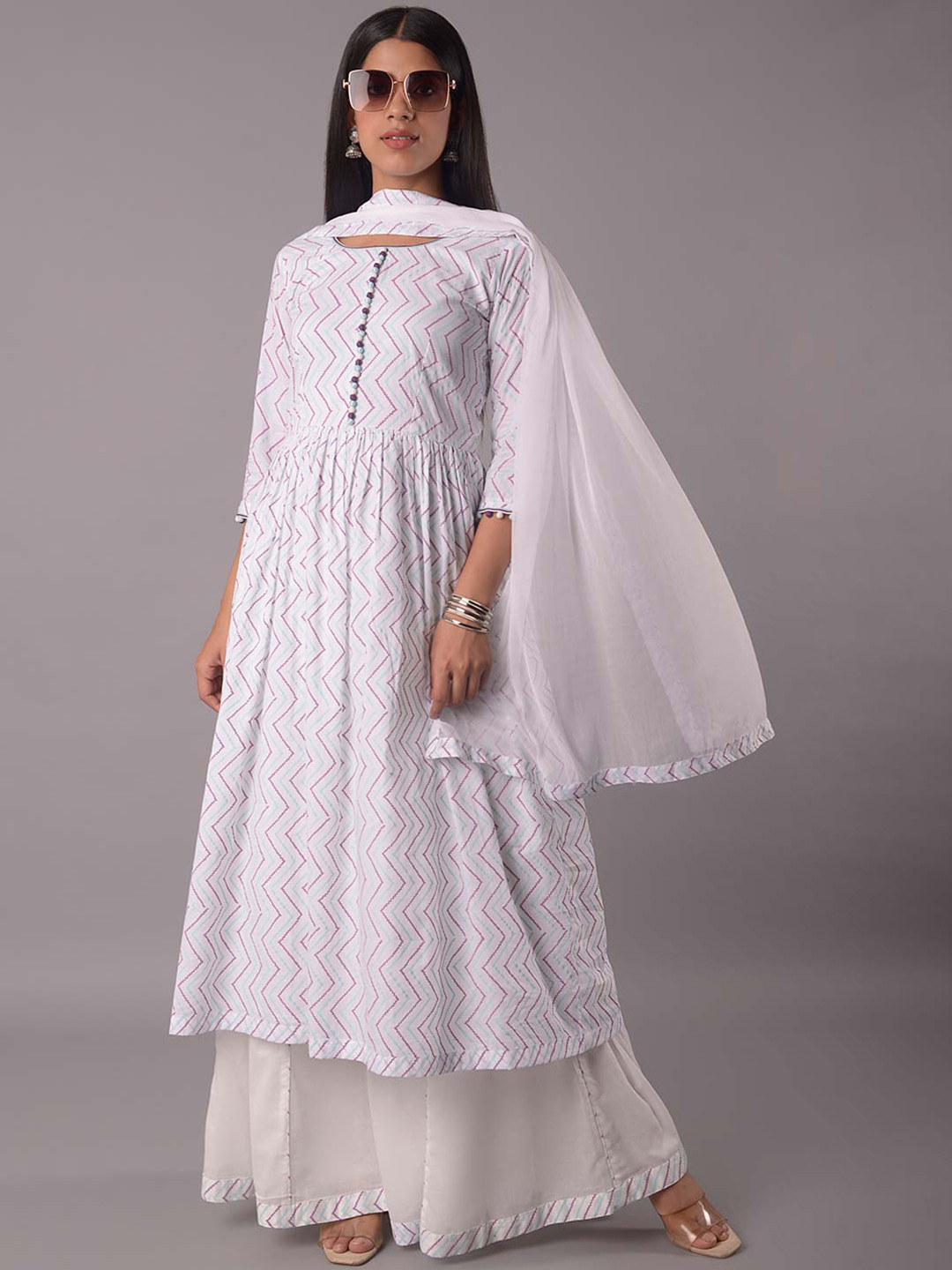 Utsav Fashion Printed Panelled Beads and Stones Kurta with Sharara & With Dupatta