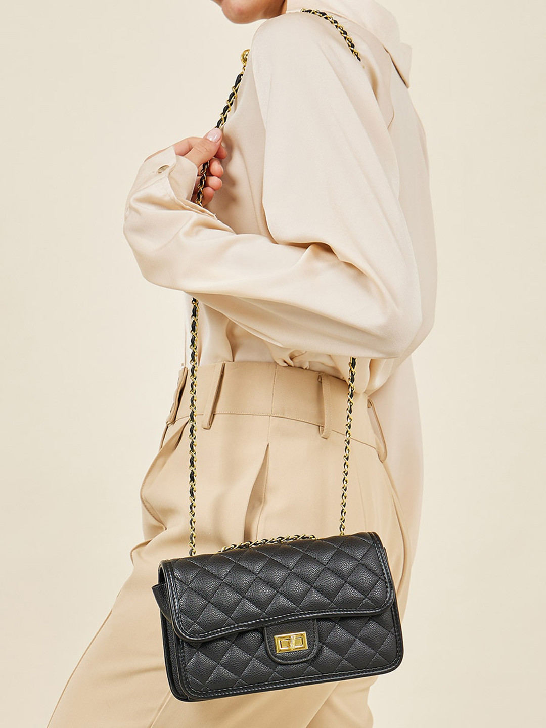 Styli Quilted Twisted Lock Sling Bag