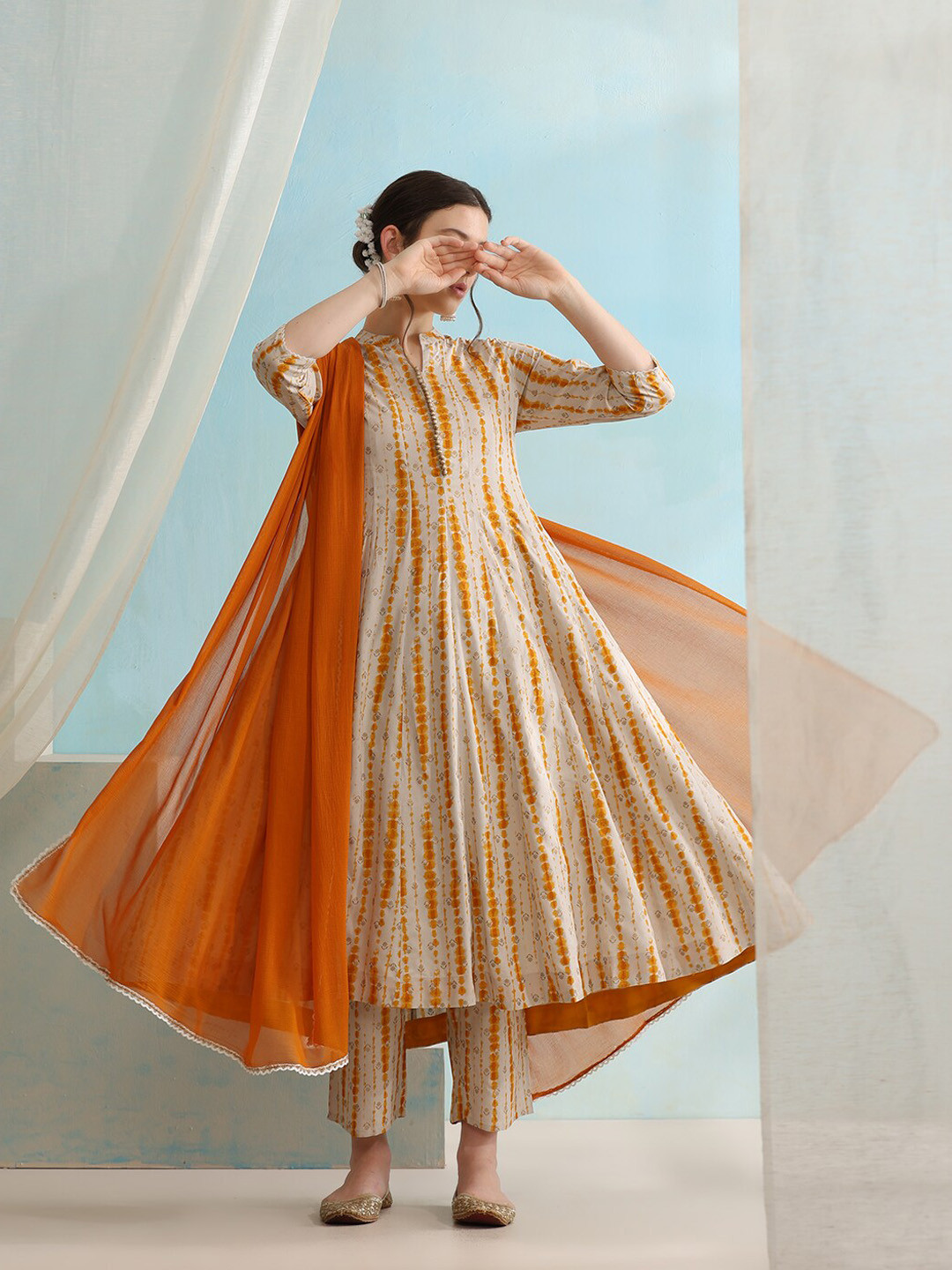 Khushal K Striped Dyed Mandarin CollarThree-Quarter Sleeves Kurta Set