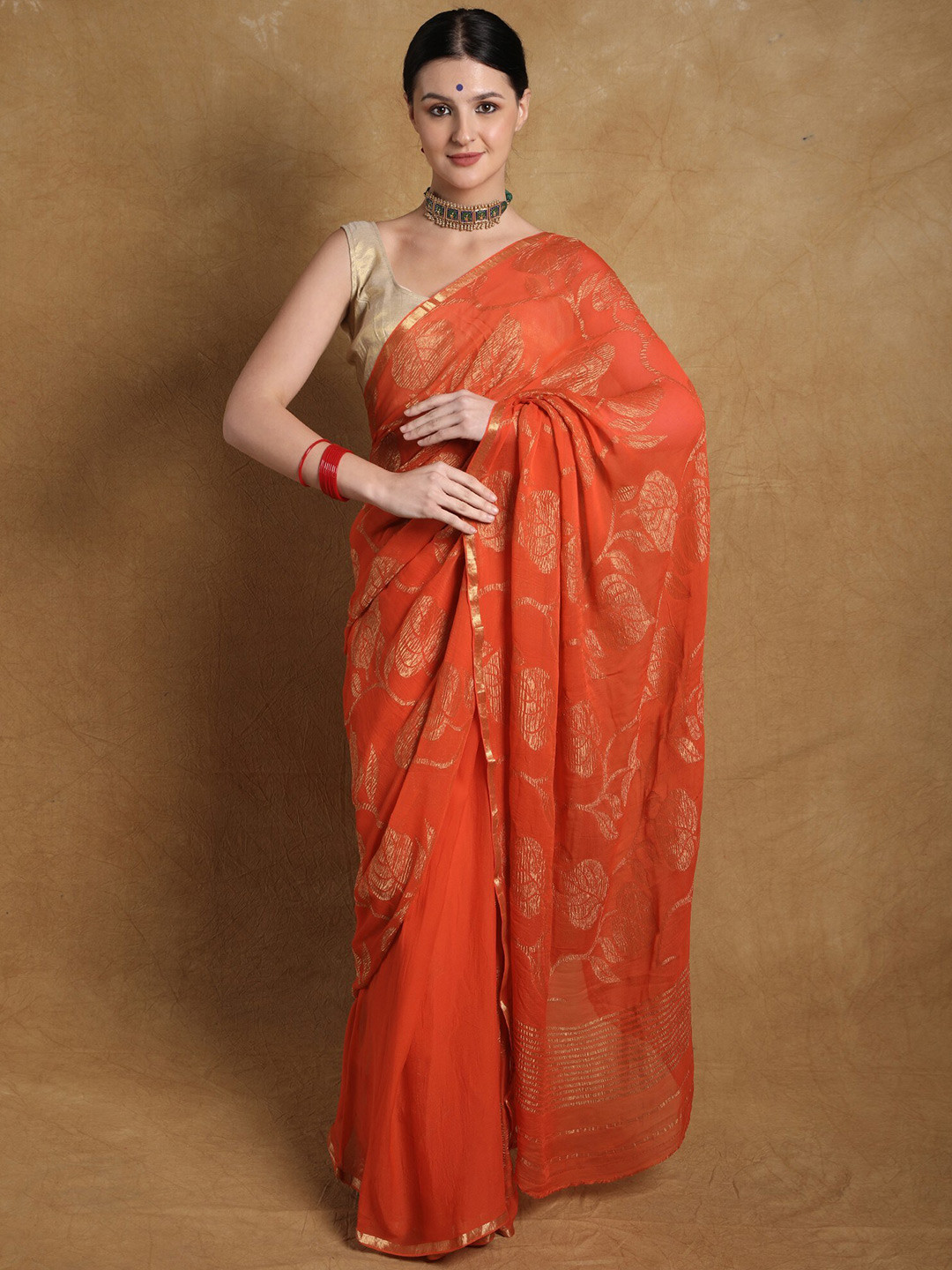 Exotic India Orangeade Banarasi Pure Chiffon Handloom Saree with Woven Betel Leaf Vines