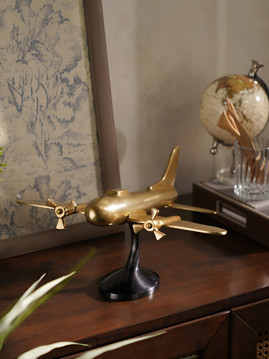 Pure Home and Living Gold Toned & Black Curio Showpiece