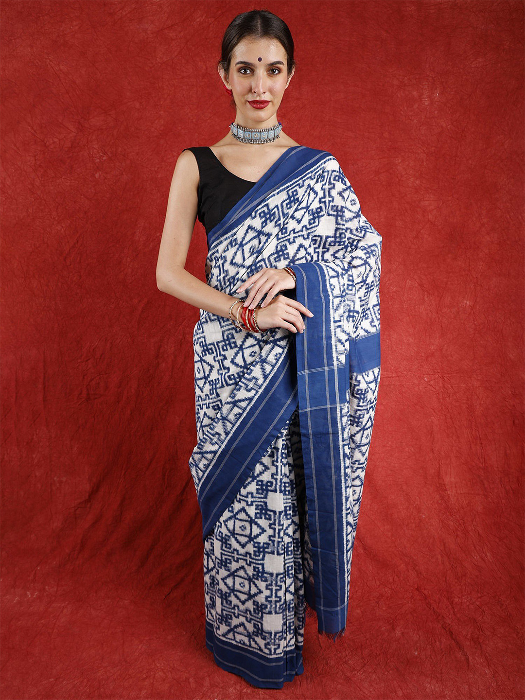 Exotic India Star White Pure Cotton Pochampally Handloom Saree with All over Ikat Weave