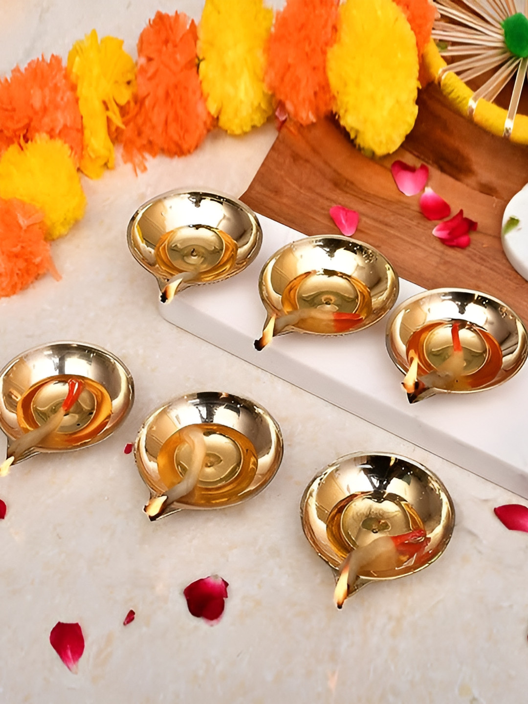 Aura 4-Pcs Yellow Pure Brass Diyas
