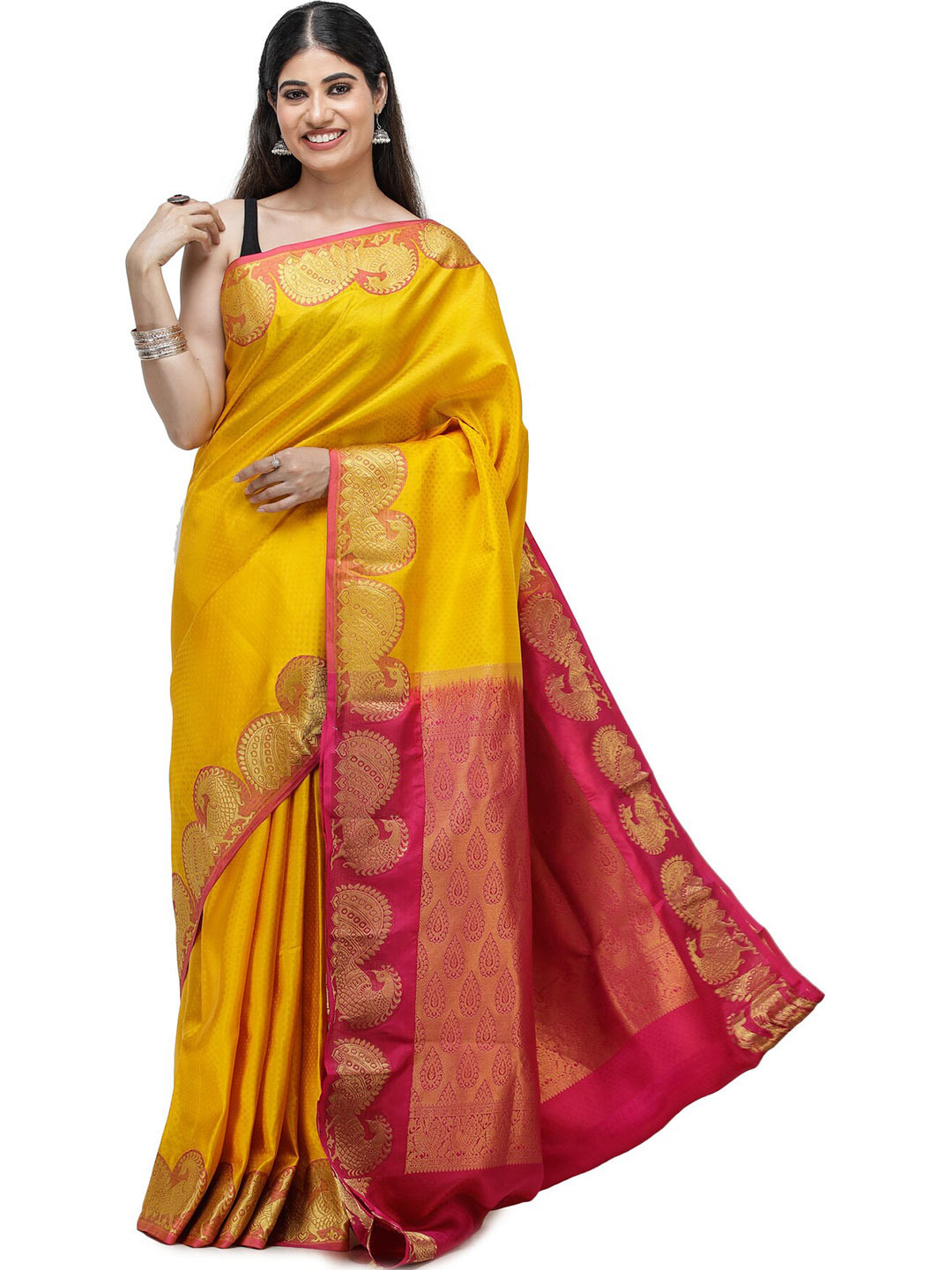 Exotic India Brocaded Amber Yellow Saree with Peacocks Border
