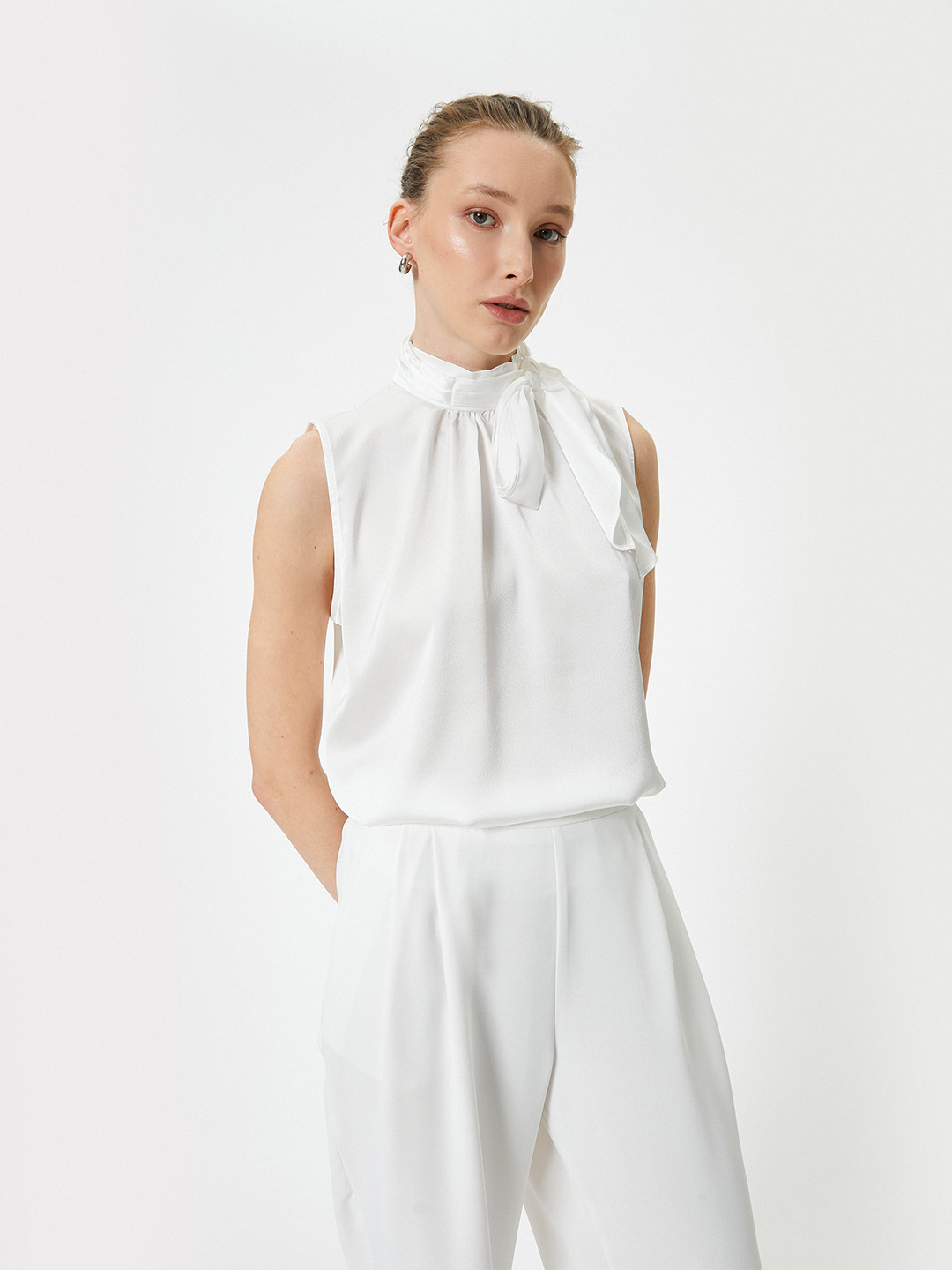 Koton Solid Pattern High Neck Sleeveless Top