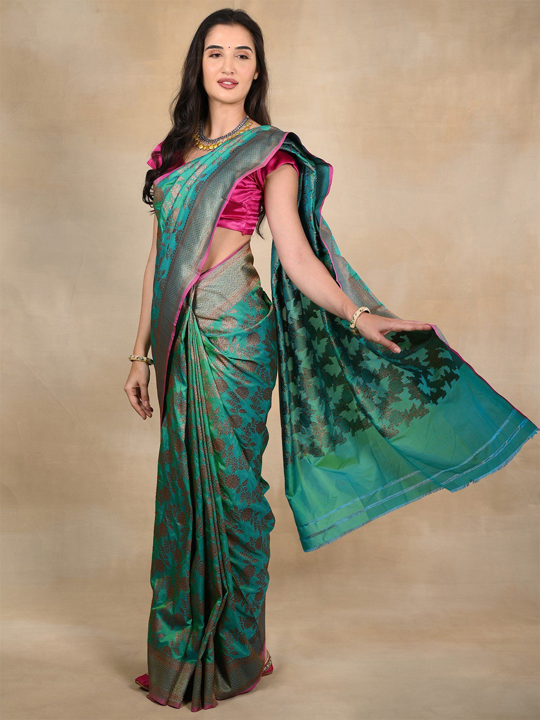 Exotic India Sea-Green Golden Zari Motifs Banarasi Saree and Magenta Pink Border