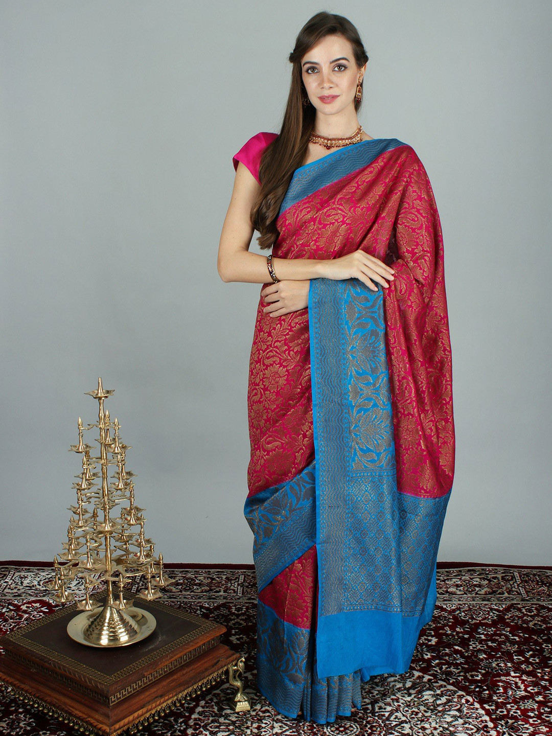 Exotic India Art Silk Fuchsia Purple Saree with Rich All Over Woven Golden Bootis