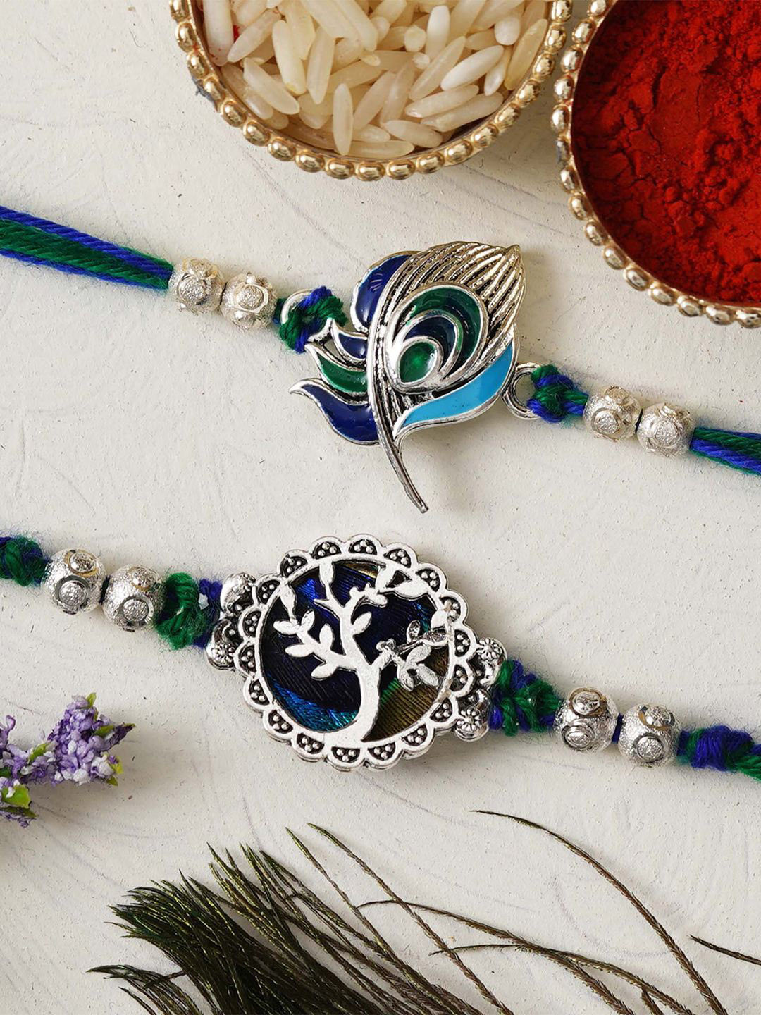 eCraftIndia Unisex Set of 2 Peacock Feather and Floral Designer Rakhis