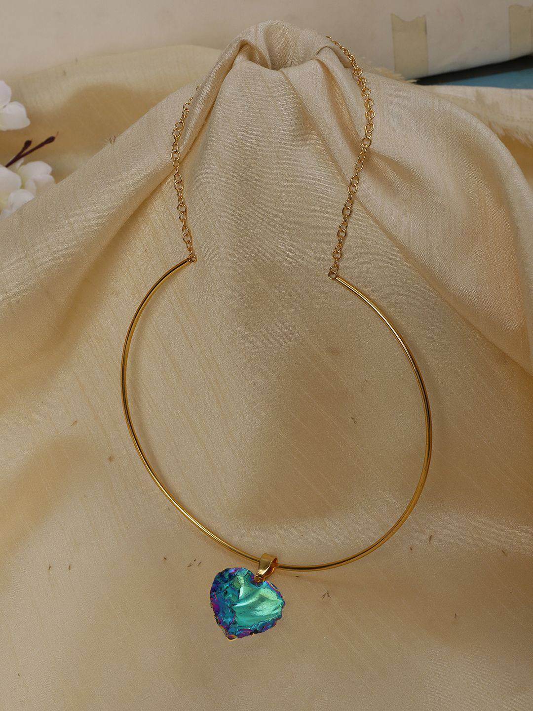 XAGO Gold-Plated American Diamond Studded Heart Shaped Pendant With Chain