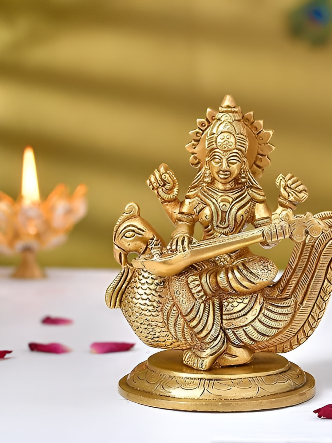 Aura Maa Saraswati Sitting on Swan Gold Brass Metallic Prayer Room Medium Showpiece - 4.5 Inches
