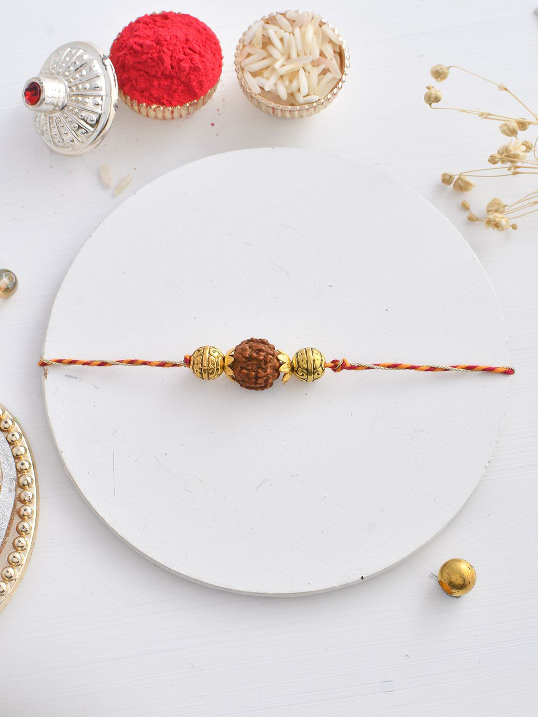 Aapno Rajasthan Rudraksh & Metal Beads Braided Moli Rakhi