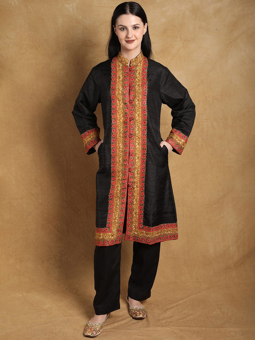 Exotic India Black Kashmiri Long Jacket with Aari Hand Embroidered Paisleys on Border