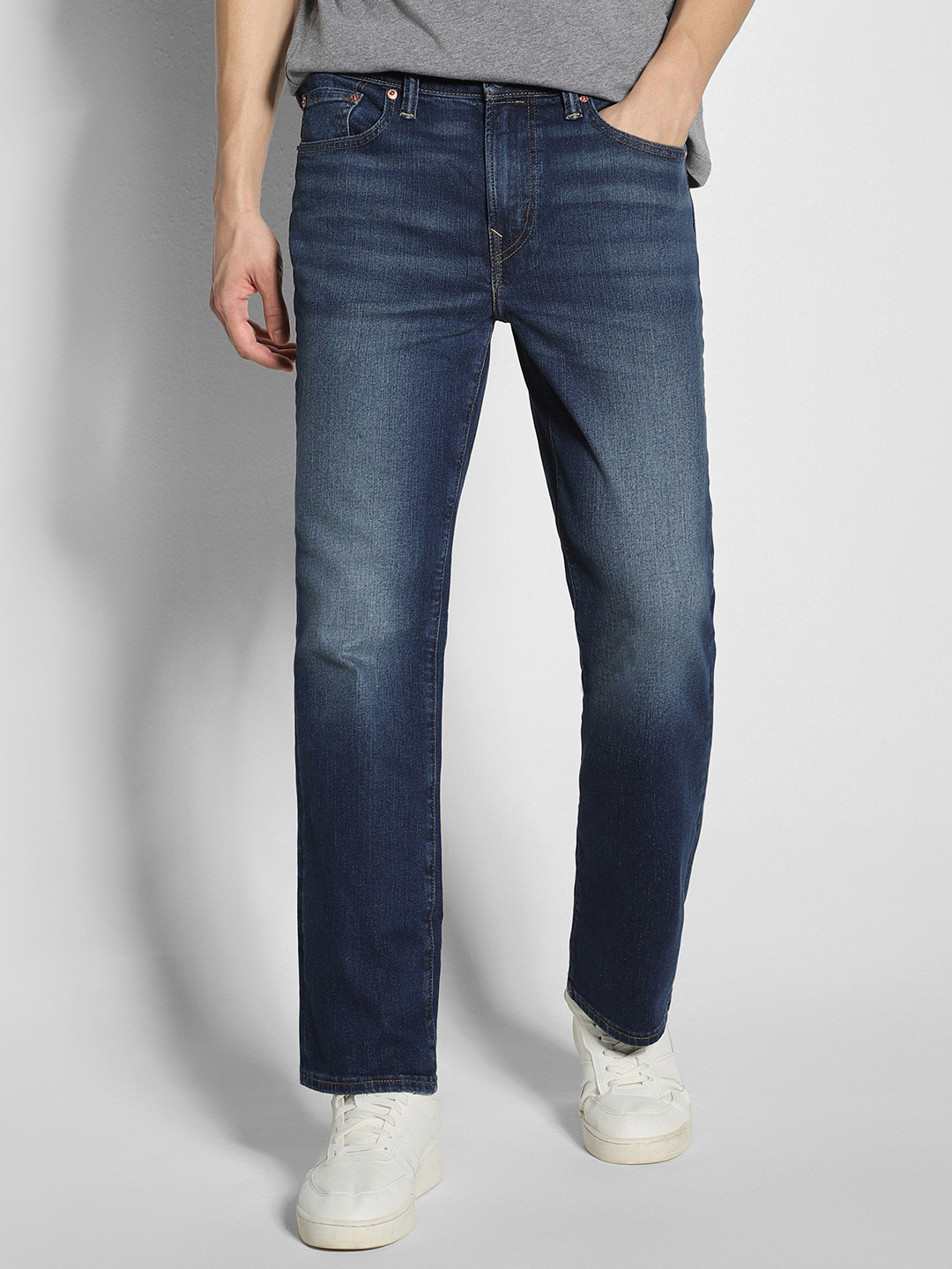 AMERICAN EAGLE OUTFITTERS Men AirFlex+ Original  Bootcut Low Distress Light Fade Jeans