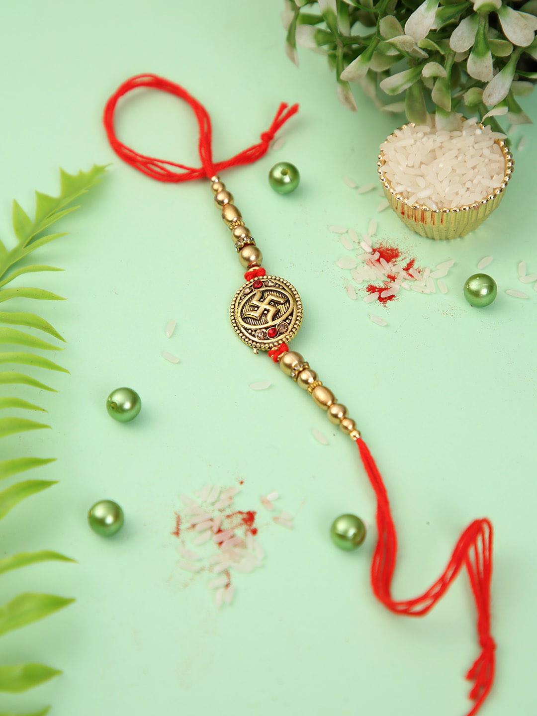Aapno Rajasthan Swastik Pearl-Beaded Rakhi with Roli Chawal & Greeting Card