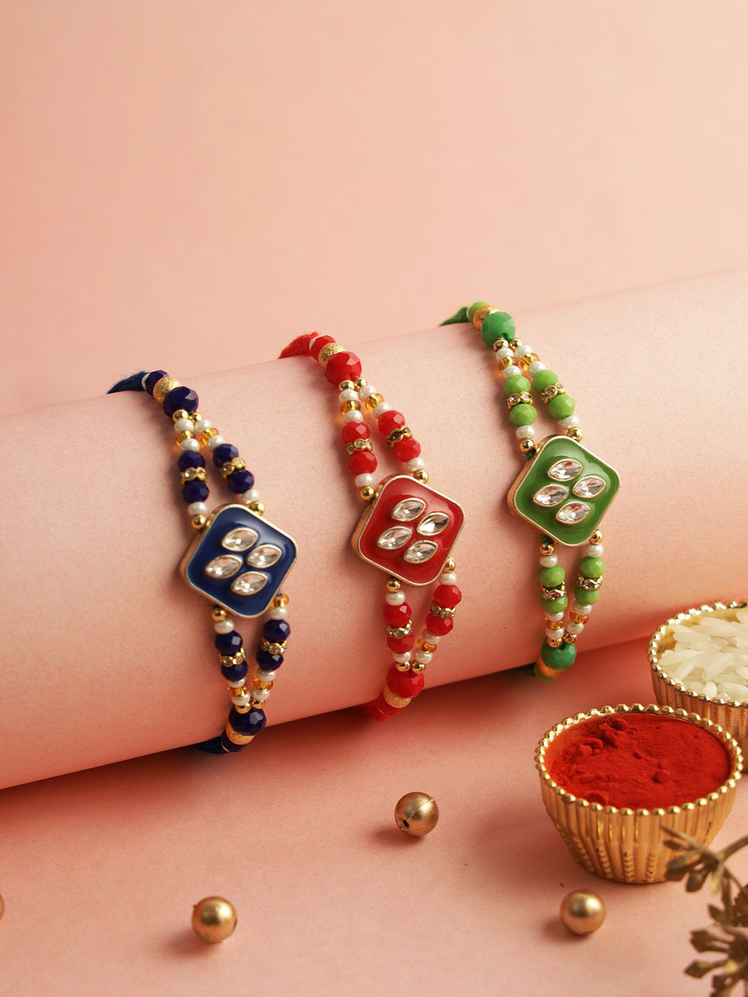Aapno Rajasthan Set of 3 Stoned-Studded Rakhi with Roli Chawal & Greeting Card