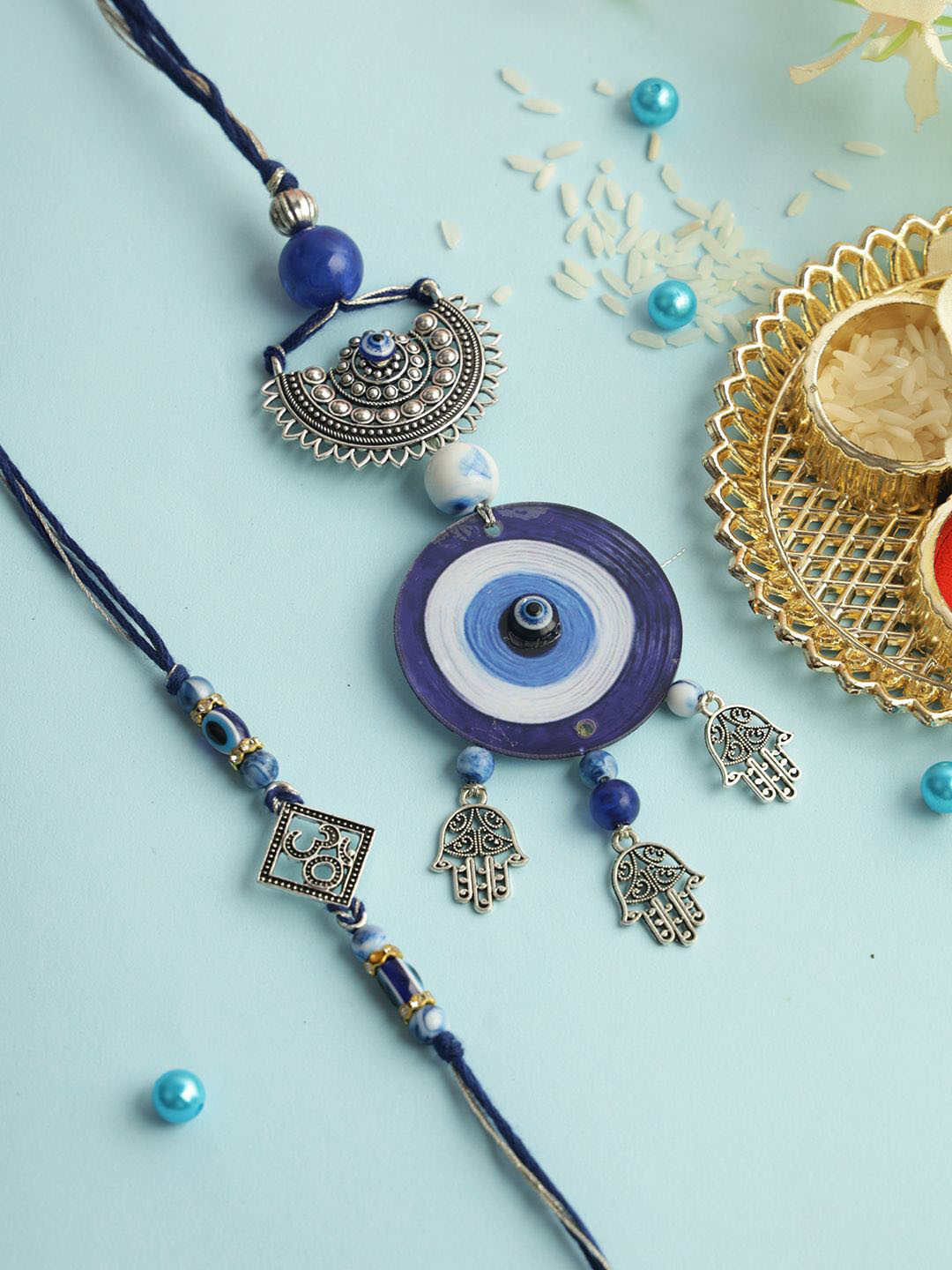 Aapno Rajasthan Set of 2 Evil Eye Bhaiya Bhabhi Rakhi with Roli Chawal & Greeting Card