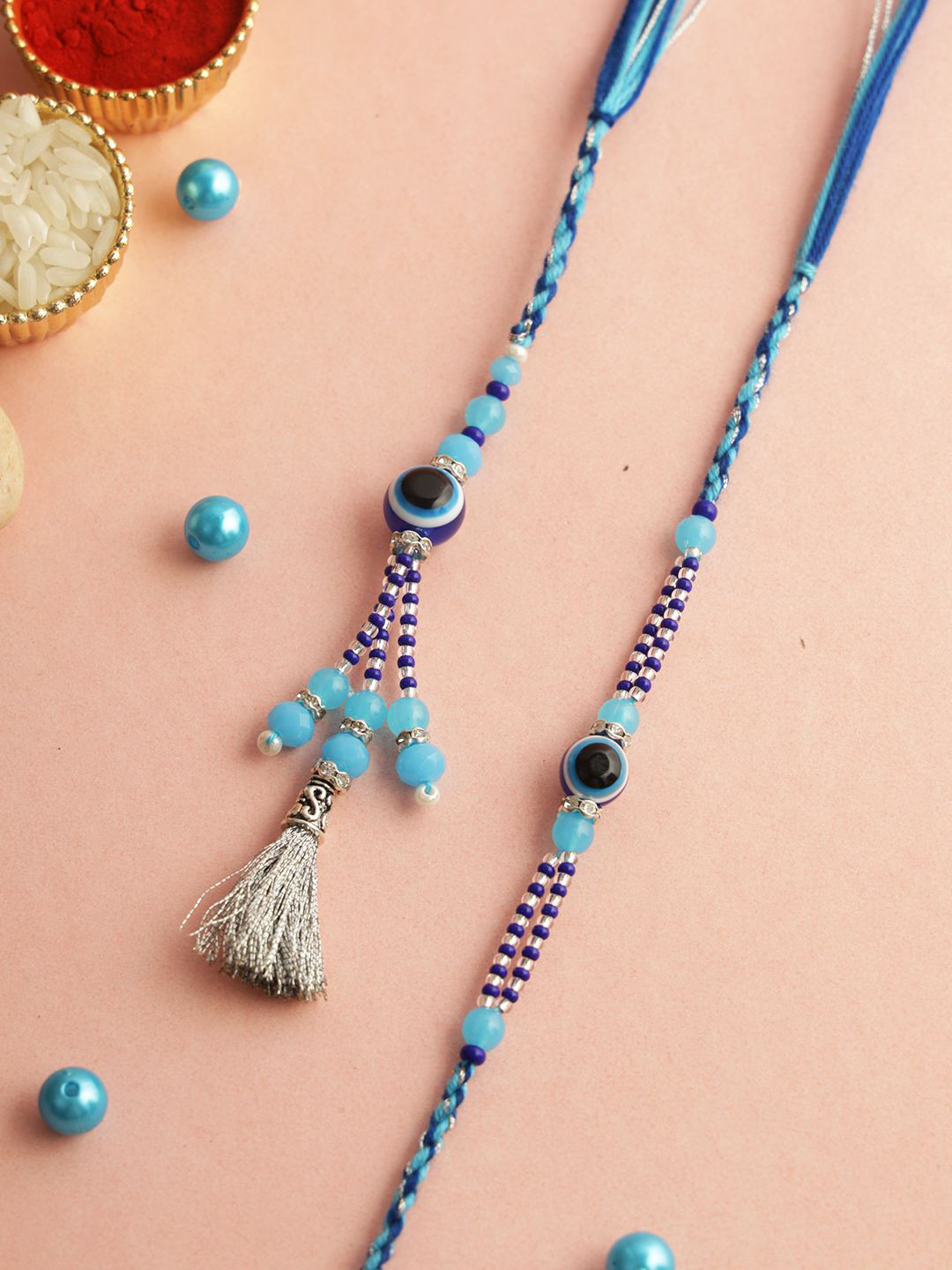 Aapno Rajasthan Set of 2 Evil Eye Bhaiya Bhabhi Rakhi with Roli Chawal & Greeting Card