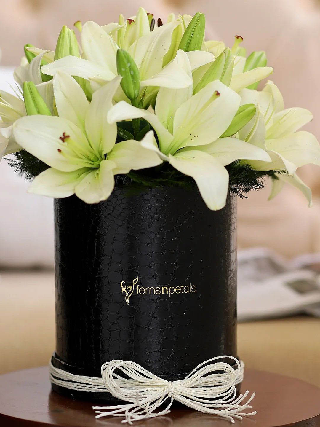 fnp White 7 Pieces Asiatic Lilies Fresh Flowers Bouquet