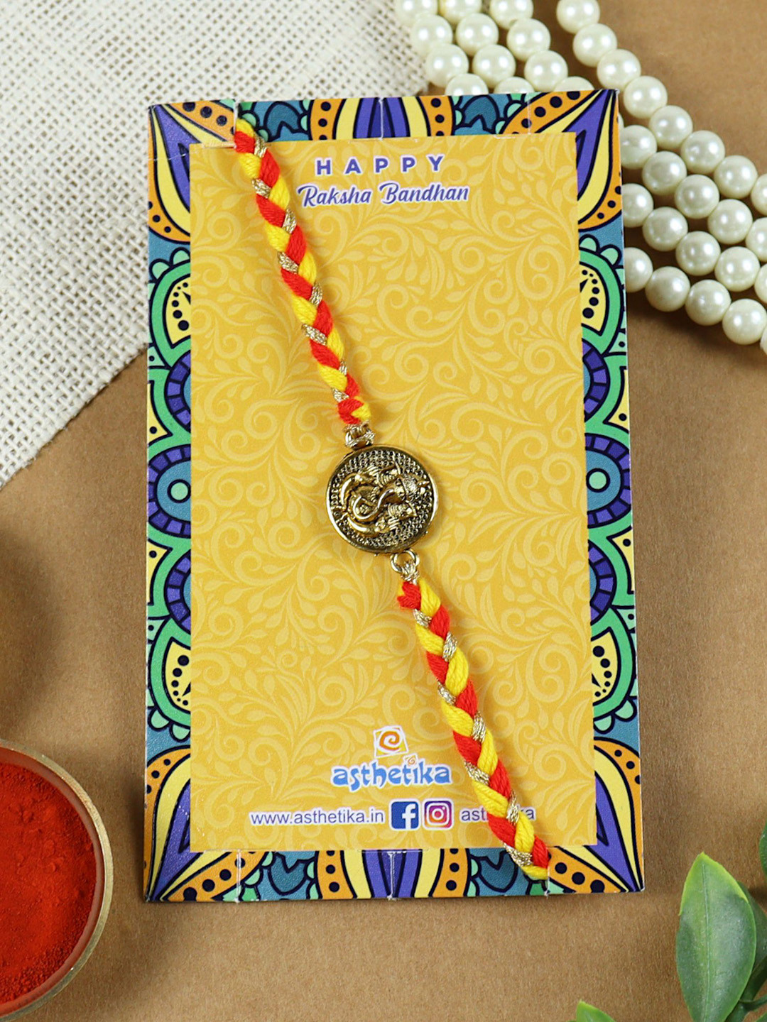 Asthetika Ganesha Charm Braided Rakhi With Roli Chawal