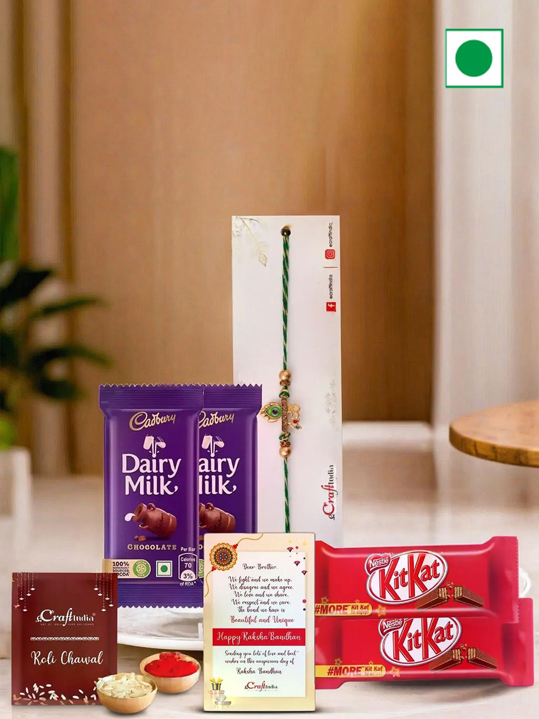 eCraftIndia Om Peacock Feather Rakhi With Chocolates & Greeting Card With Roli Chawal