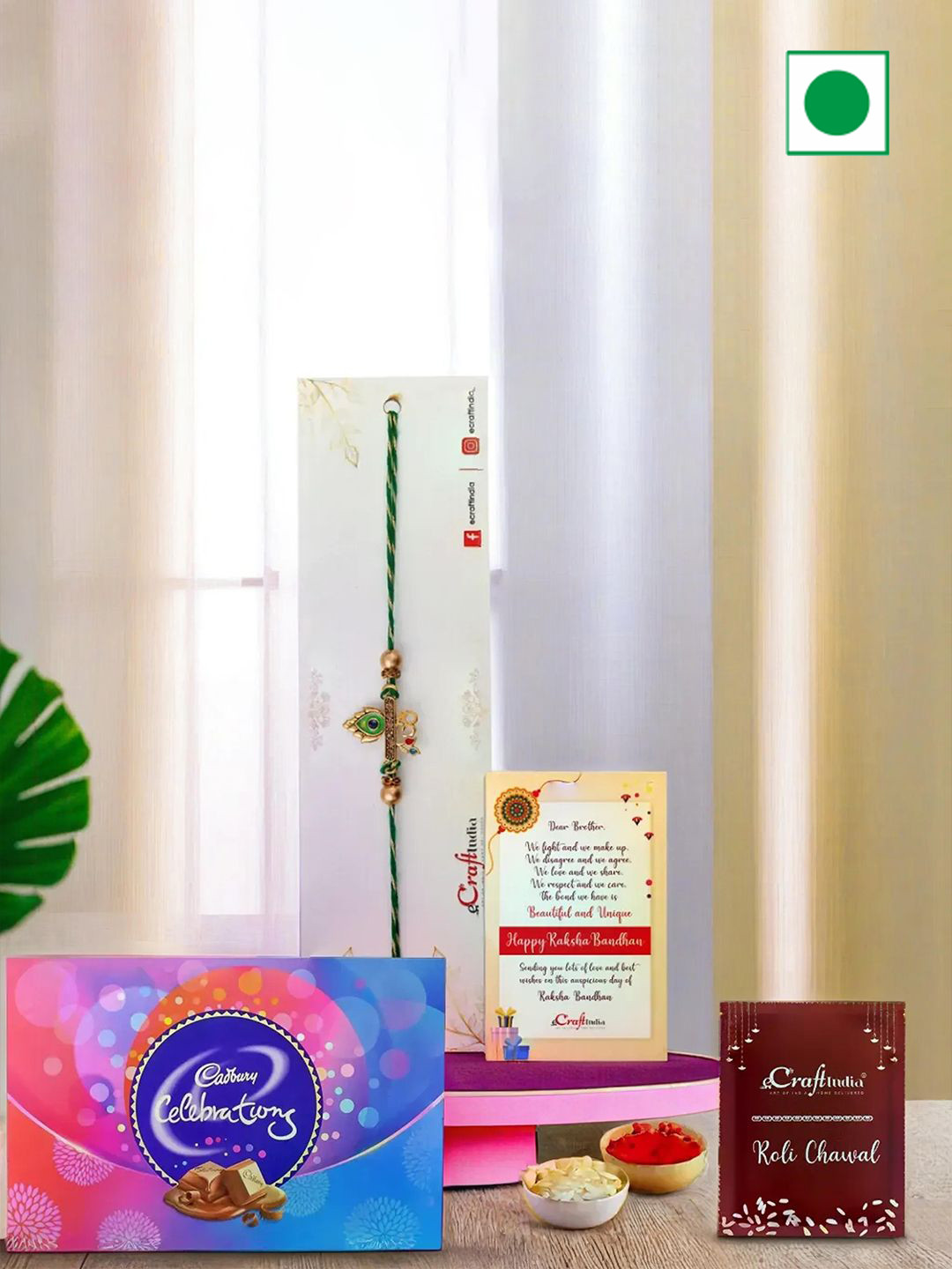 eCraftIndia Om Peacock Feather Rakhi With Cadbury Celebration 9 Chocolates