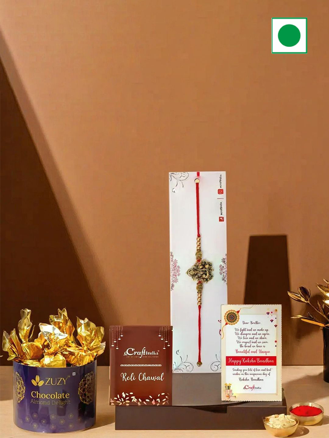 eCraftIndia Ganesha Rakhi With Chocolate & Rholi Chawal