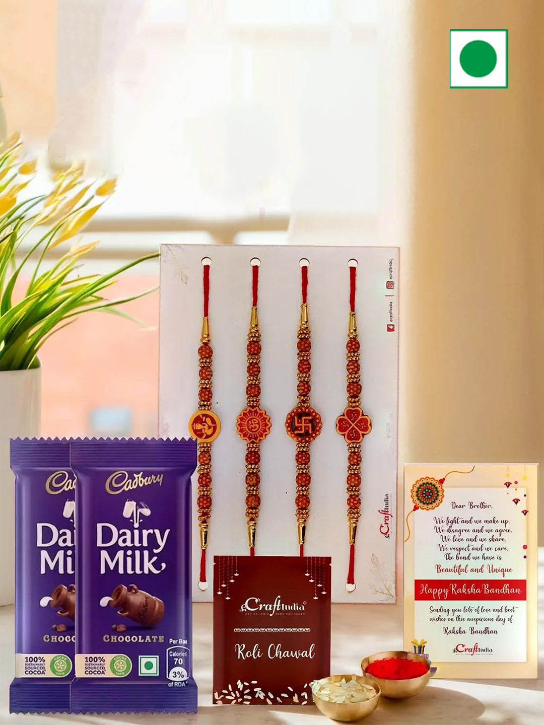eCraftIndia Set Of 4 Ganesha Om Swastika Rudraksha Rakhis With Chocolate & rholi Chawal