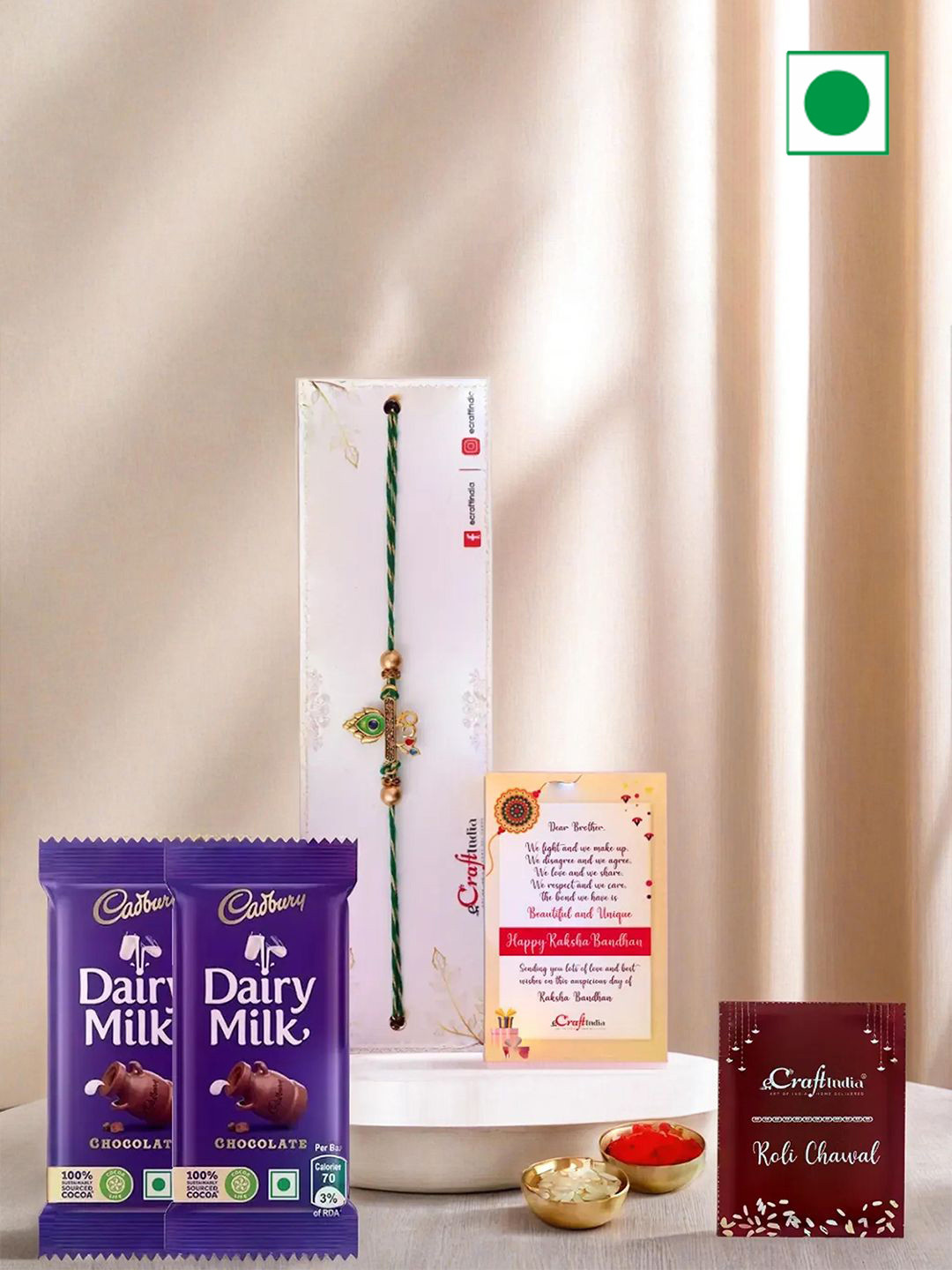 eCraftIndia Om Peacock Feather Rakhi With Cadbury & Greeting Card with Roli Chawal