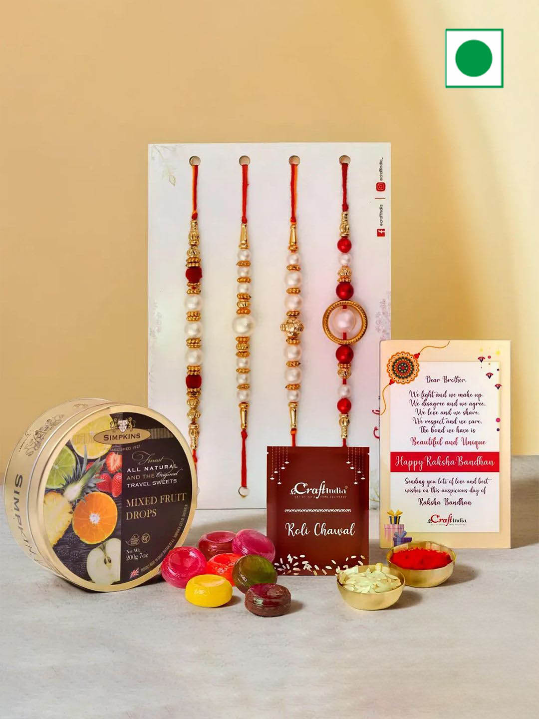 eCraftIndia Set of 4 Rakhis with Drop Candy & Greeting Card With Roli Chawal