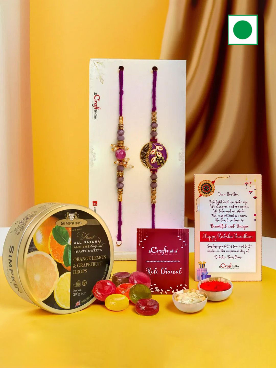 eCraftIndia Set of 2 Rakhis with Drop Candy & Greeting Card With Roli Chawal