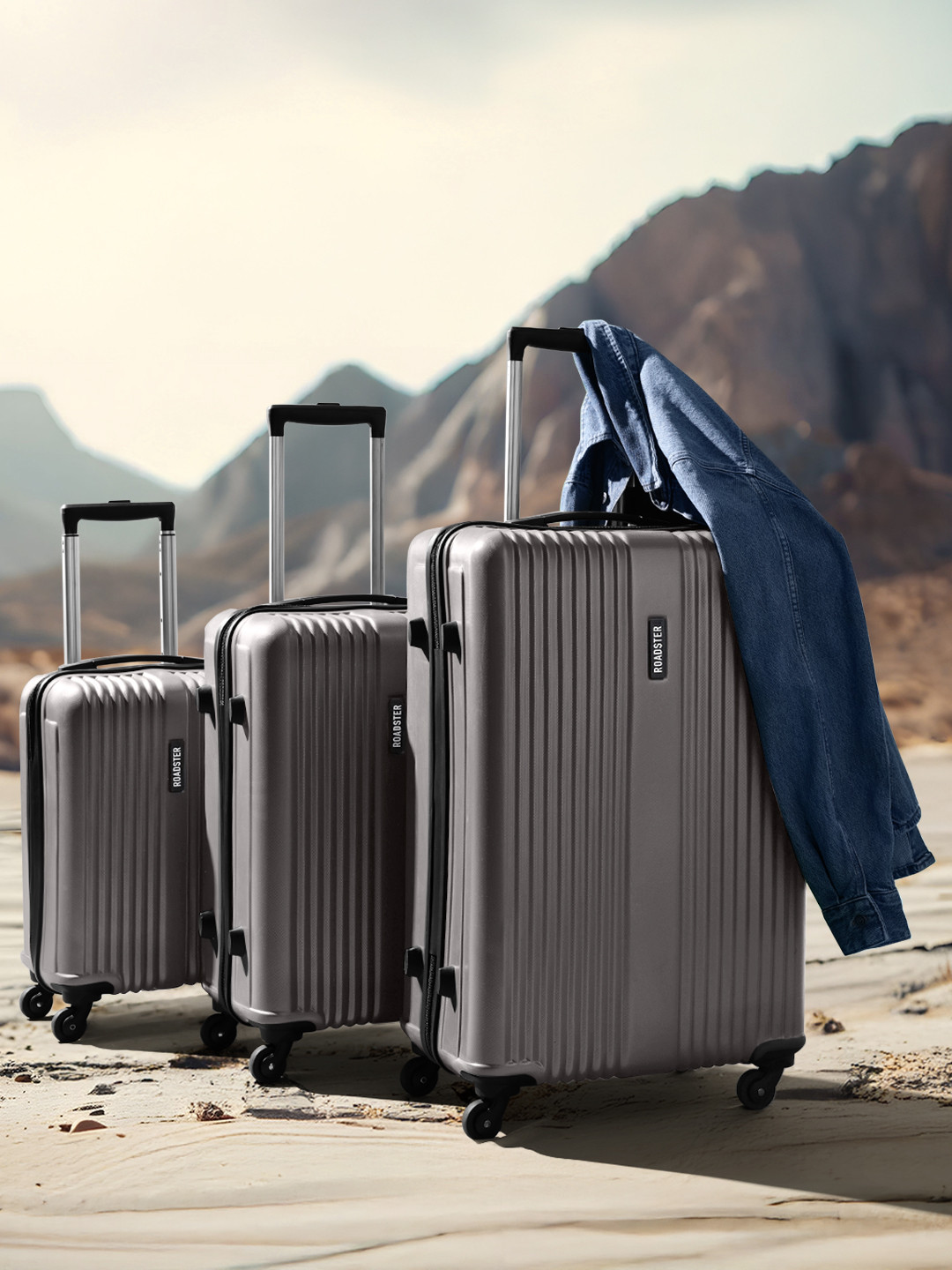 Roadster String Set Of 3 Hard-Sided Self Striped Trolley Suitcases - Cabin, Medium & Large