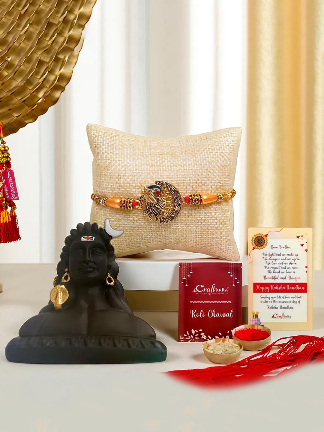 eCraftIndia Set Of 2 Peacock Detailed Rakhi With Adiyogi Lord Shiva Statue, Roil Chawal