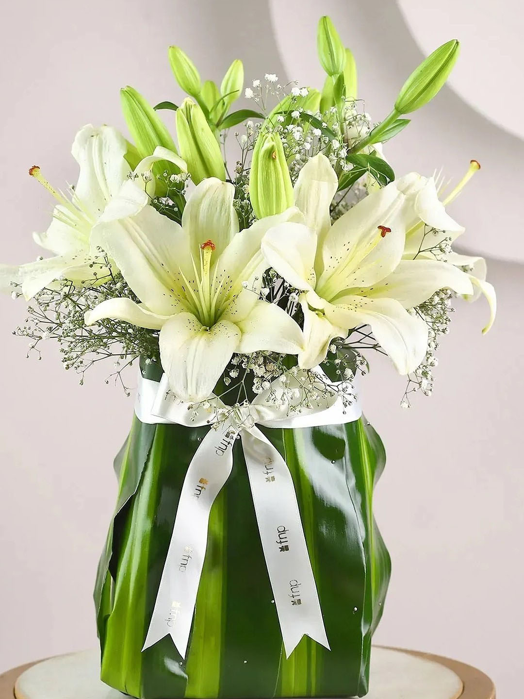 fnp White 16 Pieces  Lily Flowers Bouquet
