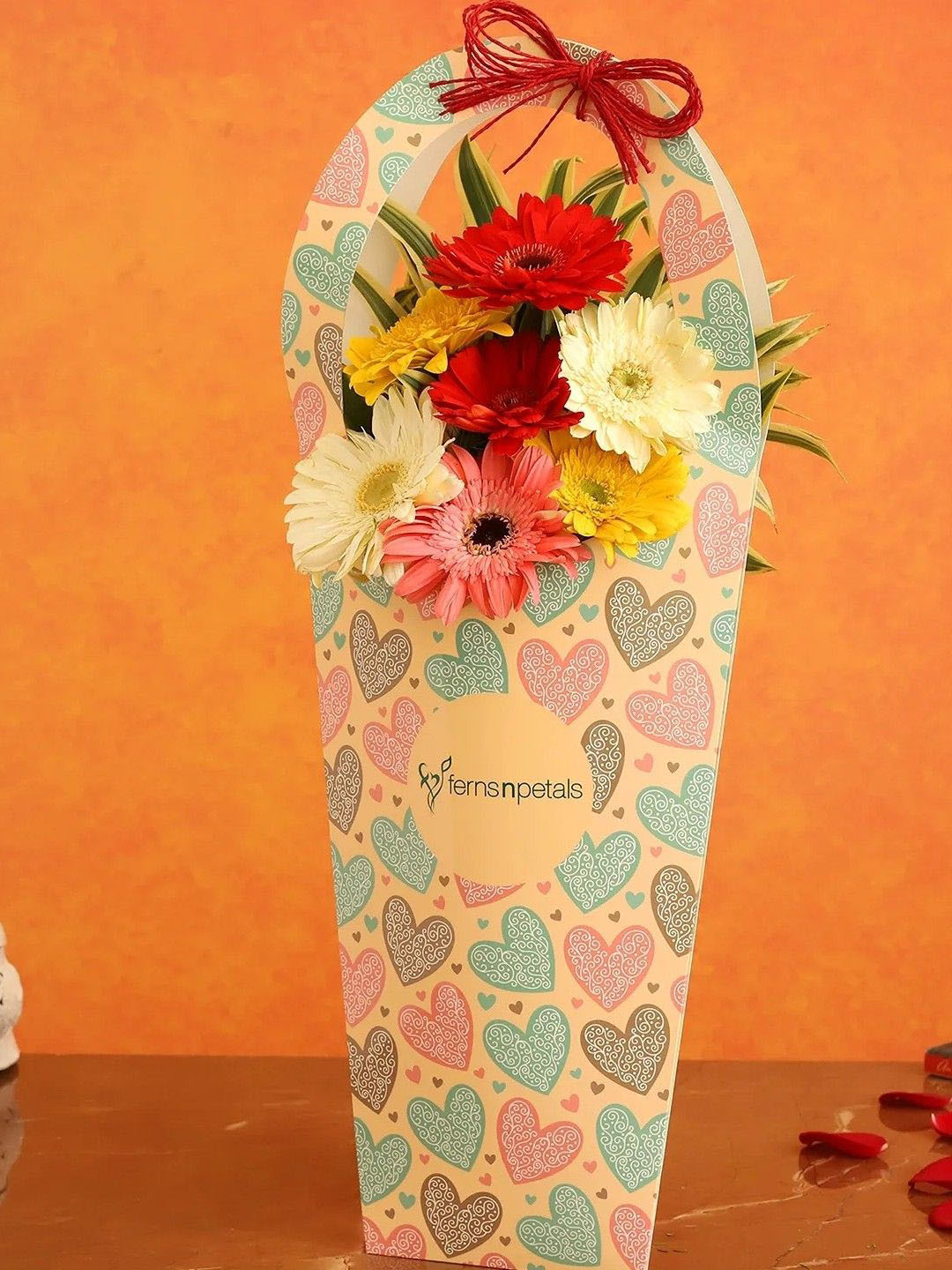 fnp Red & Yellow 7 Pieces Gerbera Fresh Heart Sleeve