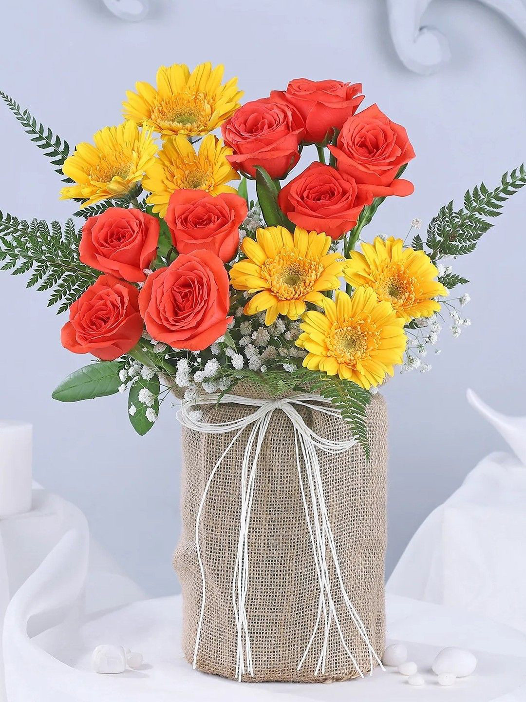 fnp Yellow & Red 14 Pieces Roses & Gerberas Potli Flower Bouquet