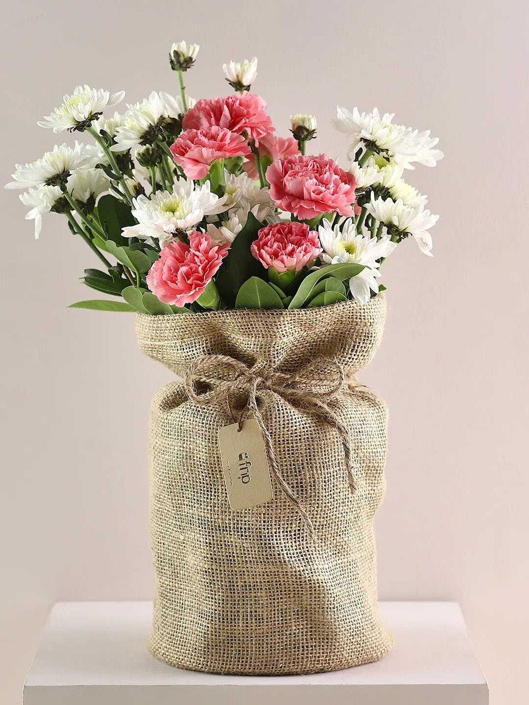 fnp White & Pink 12 Pieces Mixed Fresh Flowers Potli Bag