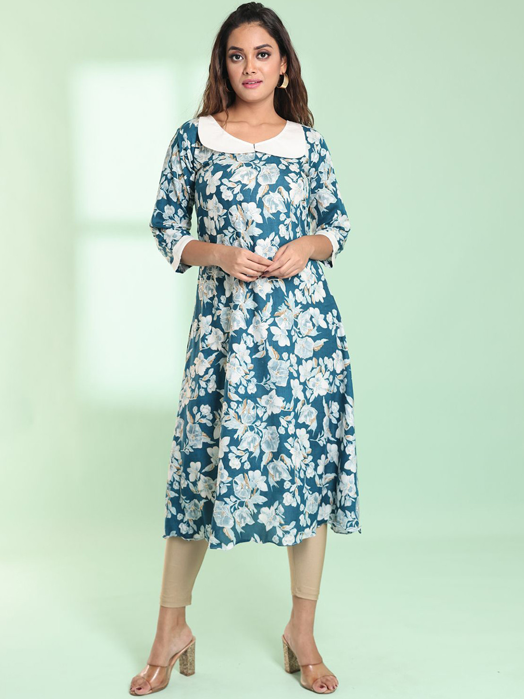 Charukriti Floral Printed Peter Pan Collar Three-Quarter Sleeves A-Line Kurta