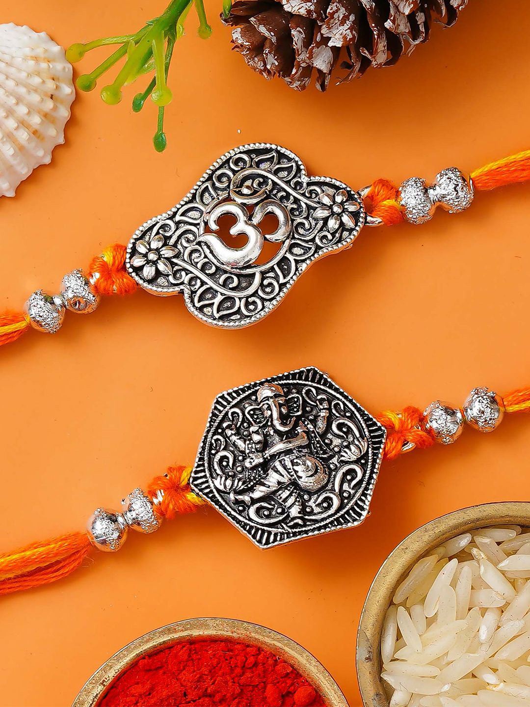 eCraftIndia Set of 2 Ganesha Om Symbol & Beaded Rakhis With Roli Chawal