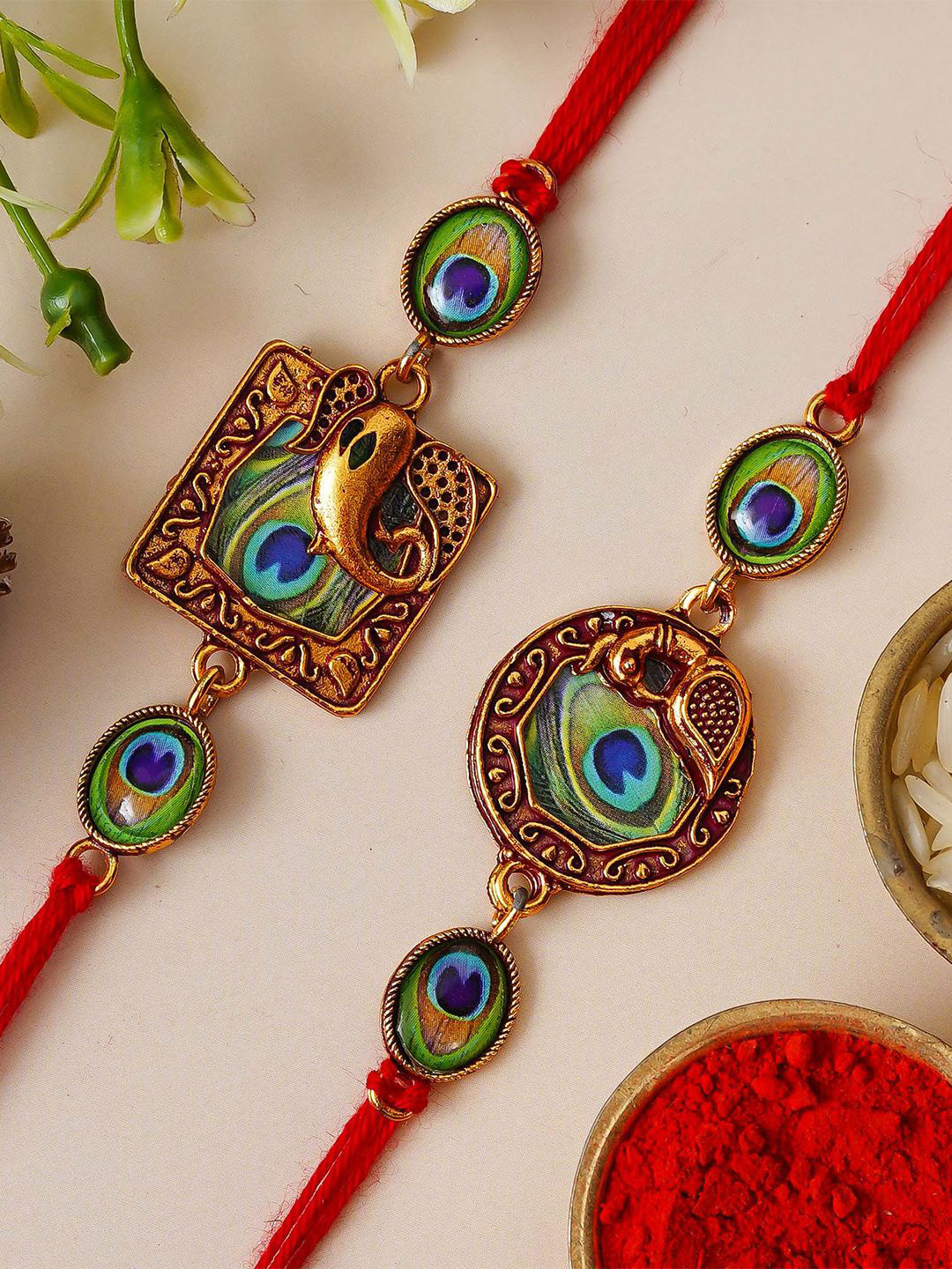 eCraftIndia Set Of 2 Ganesha Peacock Feather Thread Rakhi With Roli Chawal