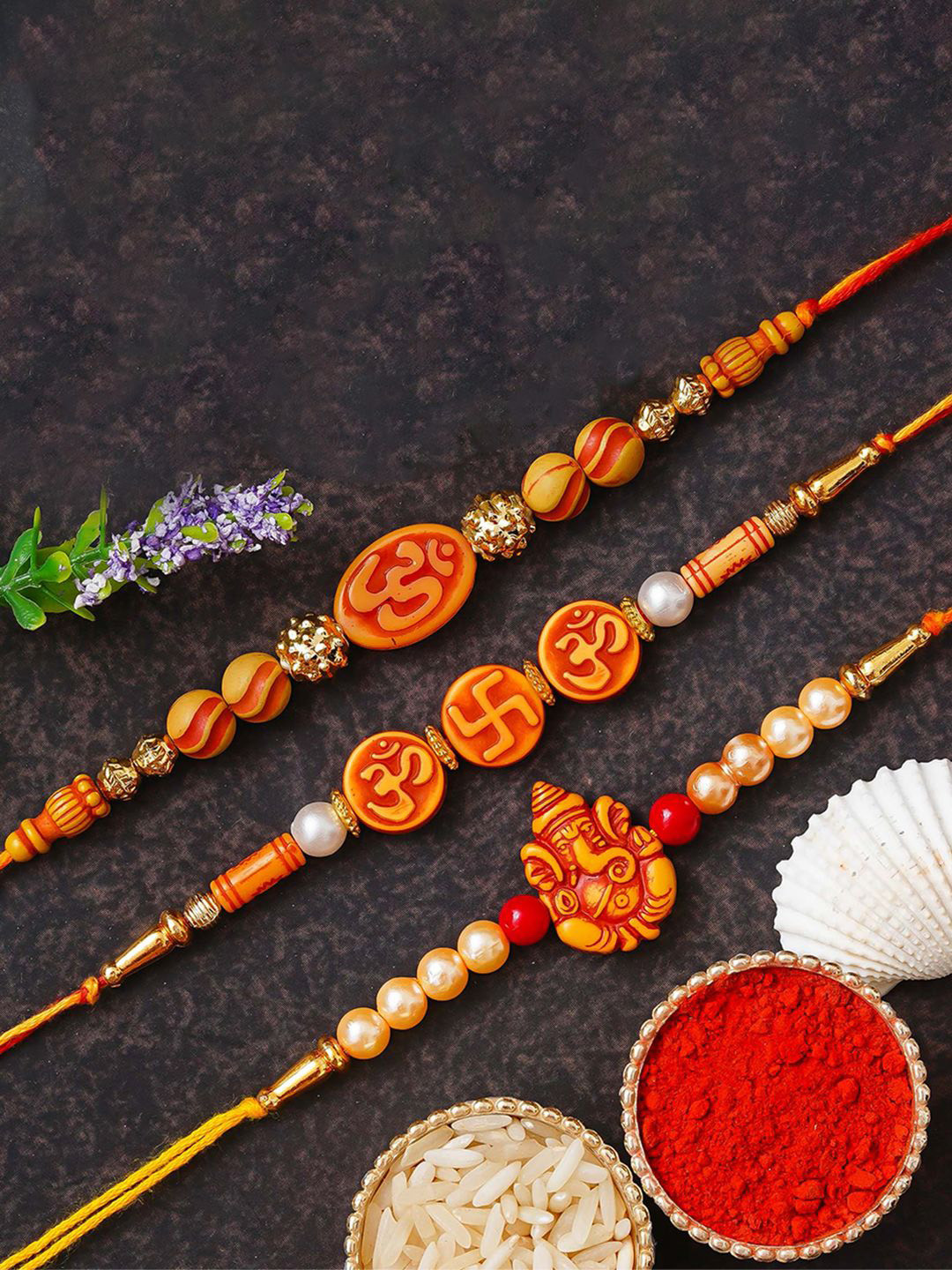 eCraftIndia Set of 3 Ganesha Om Swastika Rakhi With Roli Chawal