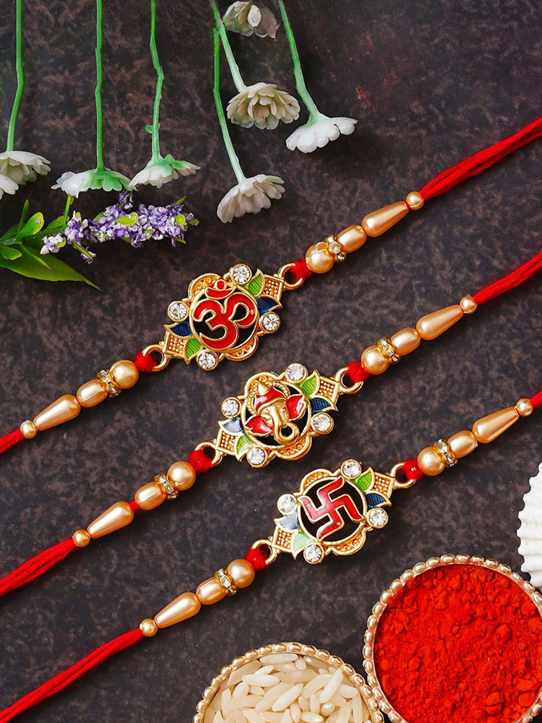 eCraftIndia Set of 3 Lord Ganesha Swastika Om Symbol Rakhis with Roli Chawal