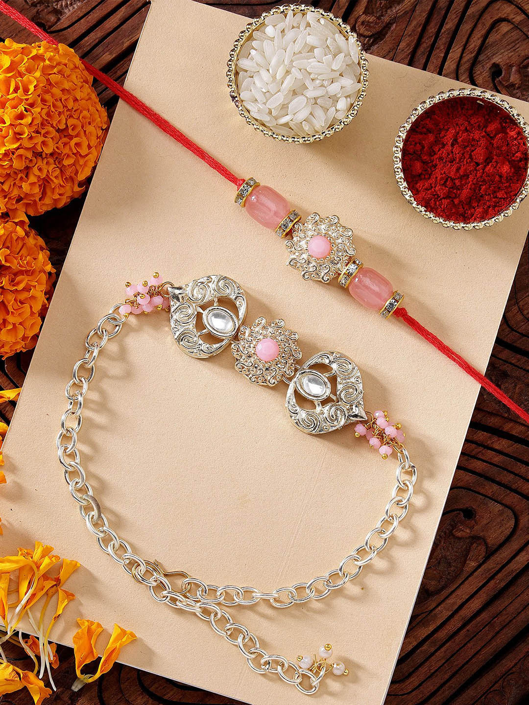 KARATCART Pink Stone Heart Shape Kundan Bhaiya Bhabhi Rakhi with Roli & Chawal