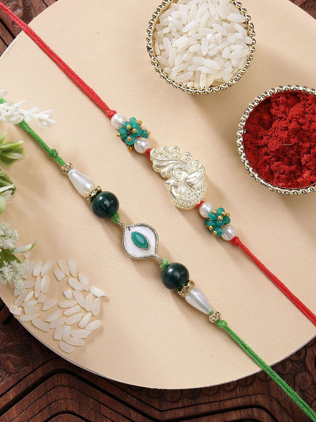 KARATCART Set of 2 Green Evil Eye & Peacock Kundan Rakhi with Roli & Chawal