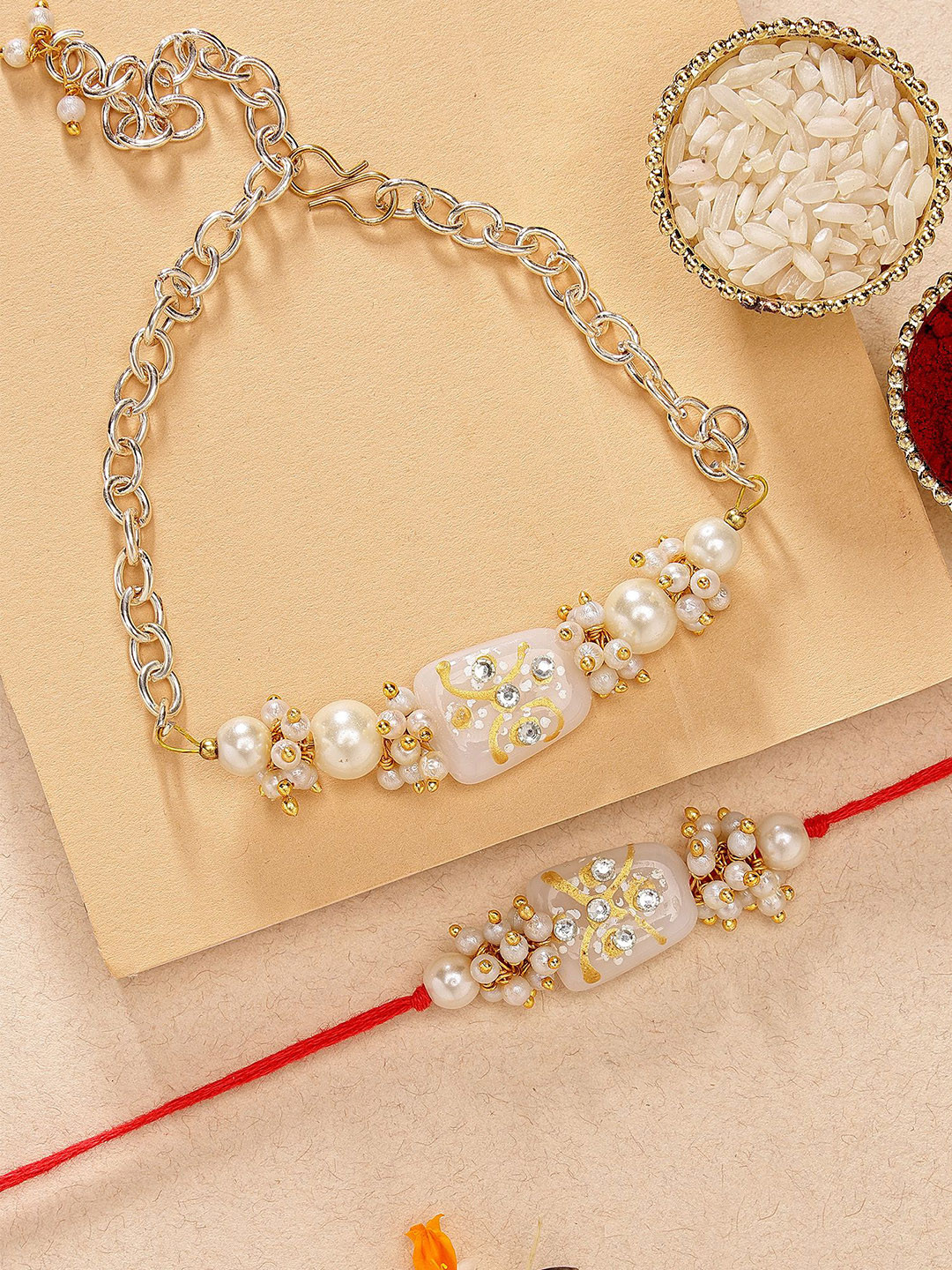 KARATCART White Tumble & Pearl Kundan Bhaiya Bhabhi Rakhi With Roli & Chawal