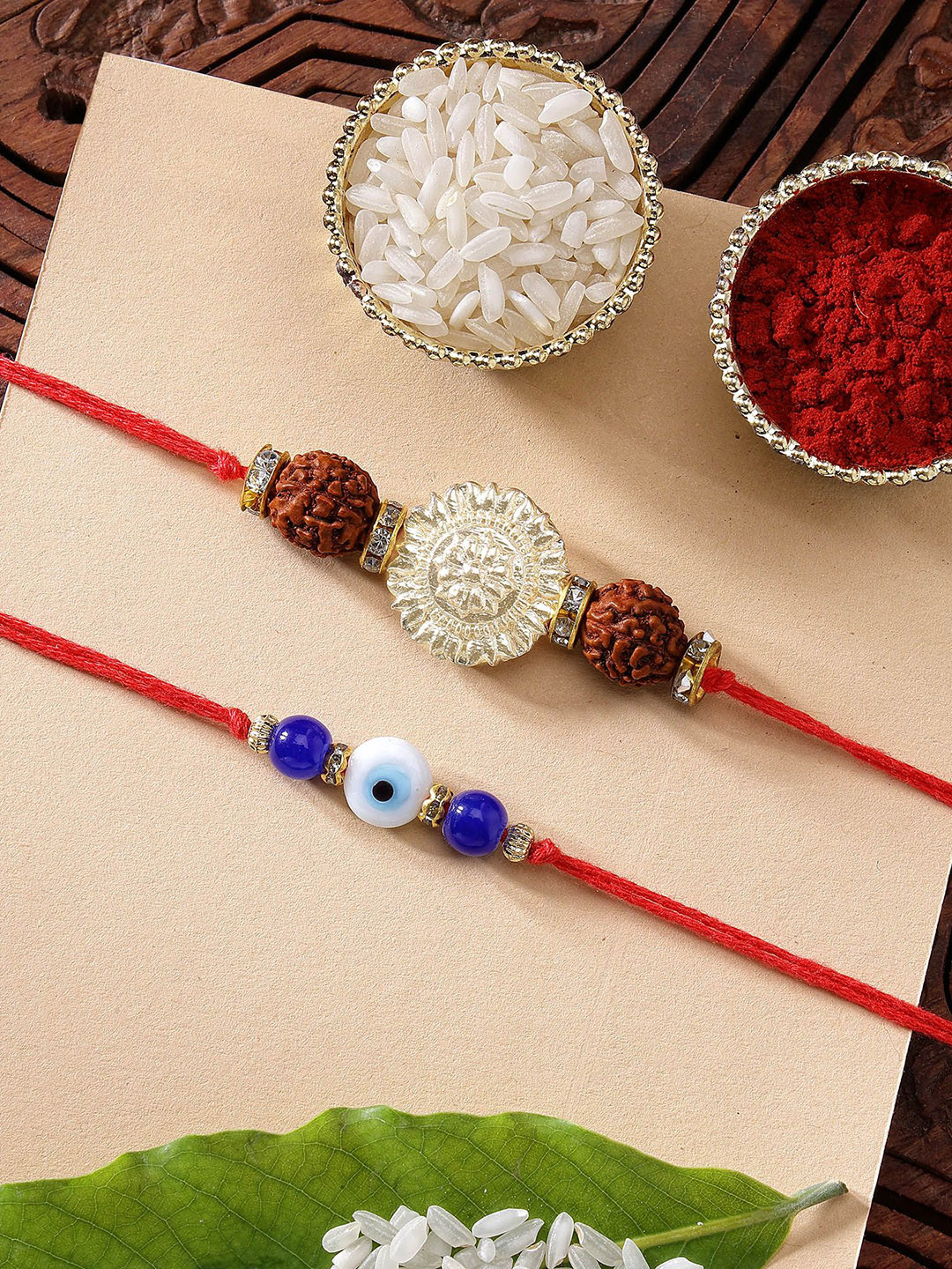 KARATCART Set of 2 Evil Eye & Rudraksha Kundan Rakhi with Roli & Chawal