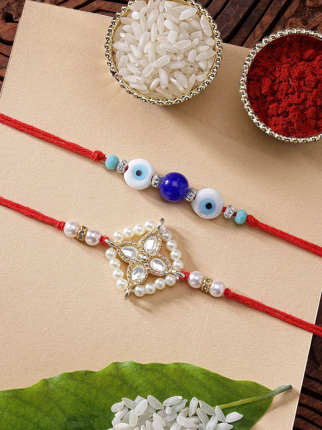 KARATCART Set of 2 Blue Bead Evil Eye Meenakari Kundan Rakhi with Roli & Chawal